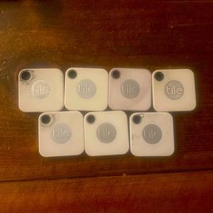 Seven Preowned Tile Mate Trackers - New batteries needed.